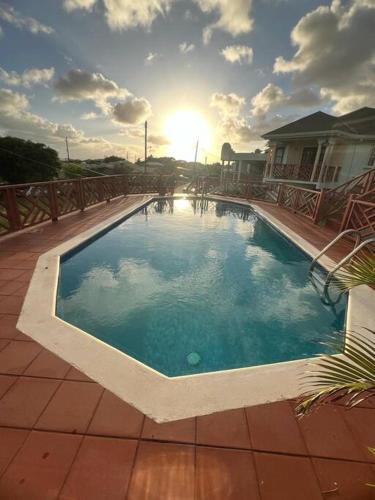 Gibbons Apartment | Lovely 2 bedroom condo with WiFi in a quiet area, 7-10 minutes away from both the airport and Oistins