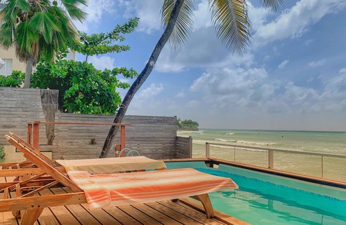 Atlantic Shores House | A Surfer's Home Away From Home! Soft round the edges, cozy and beachy