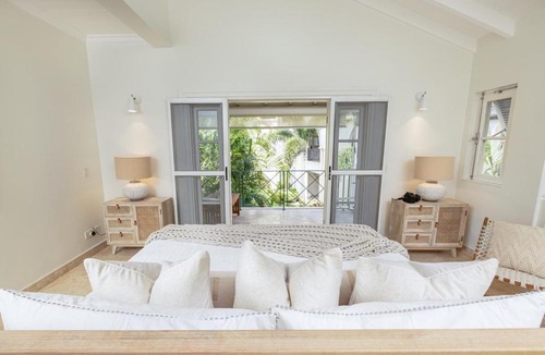 Schooner Bay Apartment | Beach Happy Beachfront Apartment by One Caribbean Estates