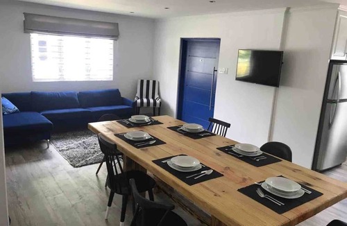 Lascelles House | Blue Door Beach House - 3 bed 2 bath w/AC, WIFI, KITCHEN, WASH/DRY & CABLE