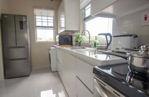 Green Garden Apartment | 🌴 Couples Hideaway, King Bed- 5 Mins to Beach & Oistins- Golden Teal