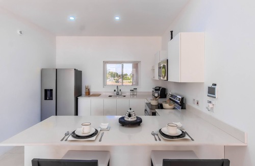 St. Lawrence Gap Condo | Modern, stylish and centrally located condo in a new gated community