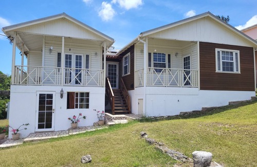 Christie House | SALE - Affordable 2 bed apt 5mins from Holetown beaches car included.