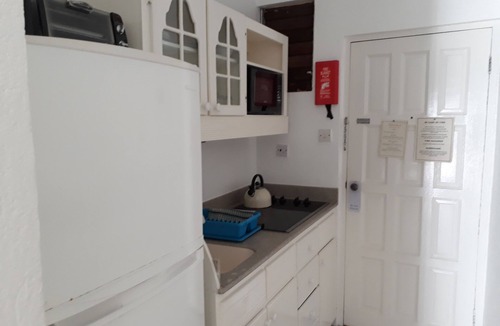 Sunset Crest Apartment | Tropical Sunset Beach Apartment Hotel