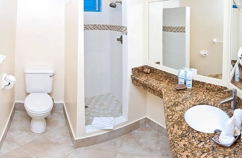 St. Lawrence Gap Hotel | Your Perfect Escape Starts Here! Balcony, Oceanfront, Outdoor Pool, Free Parking