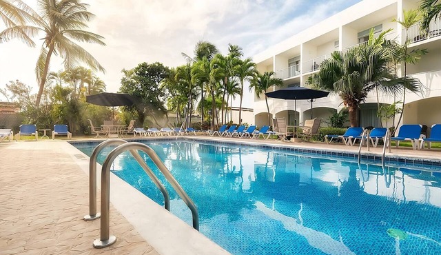 Caribbean Poolside Escape with Balcony and Beach Access