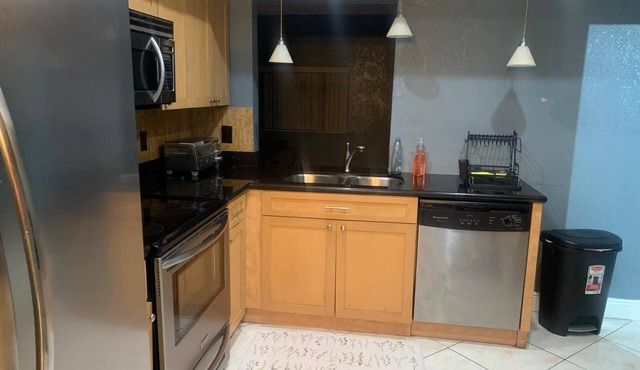 Charming 3-bedroom house with AC, WiFi in enjoyable Lauderhill in Lauderhill