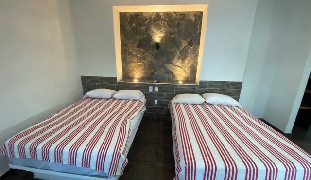 Costa Ayala suite 8 with 2 dbl bed and 1 sofa, all basics, 2 blocks from beach in Los Ayala