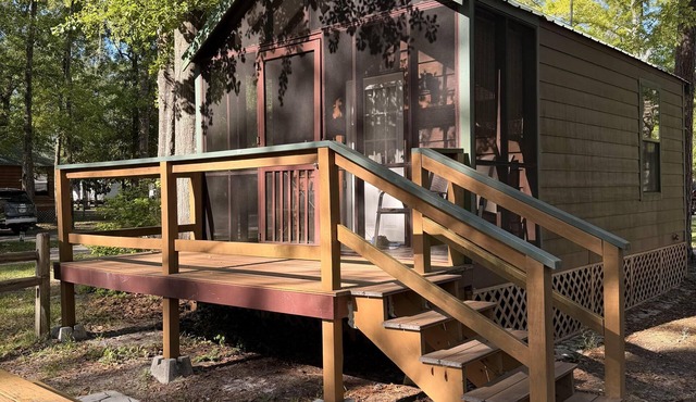 Deluxe Cabin - The River Otter Lodge - Our Deluxe Cabins offer comfort with a true Okefenokee feel. Climate controlled, private, and set in a quiet part of the campground. in Folkston