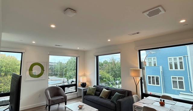 Luxury 1BR w/Rooftop 5 min to Logan Airport Free EV Garage Parking in Boston
