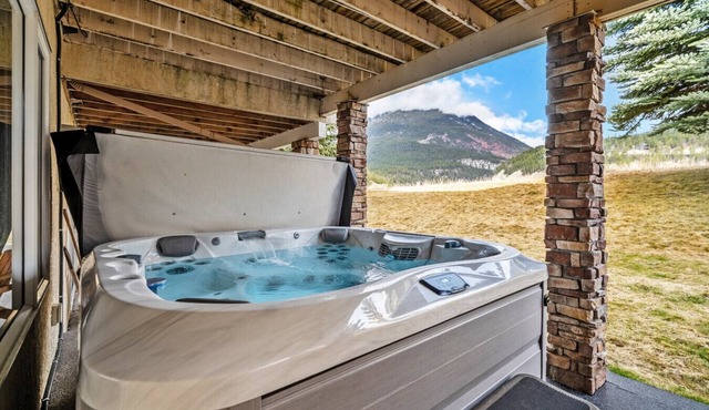 Misty Mountain Retreat | Pool/Hot Tub | Fireplace in Radium Hot Springs