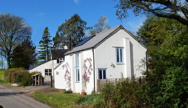 Rural Holiday Cottage with Wonderful Countryside Views on Friendly Smallholding. in Stockland