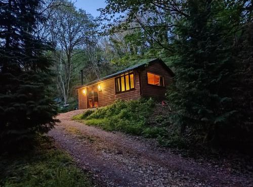 Stream-side cabin with private sauna option in Ballyduff