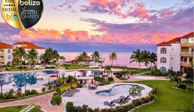 UNRIVALED VIEWS from DESIGNER RENOVATED PENTHOUSE, Top 3BR rental @ GRAND CARIBE in Ambergris Caye