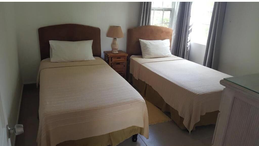 Sunset Crest Apartment | Shades Apt 2 – Comfortable Two-Bedroom Garden Apartment with Pool Access