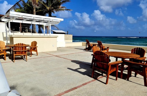 Silver Sands Apartment | Silver Sands Beachfront Condo, Shared Patio - Bar & BBQ, Indoor & Outdoor Dining