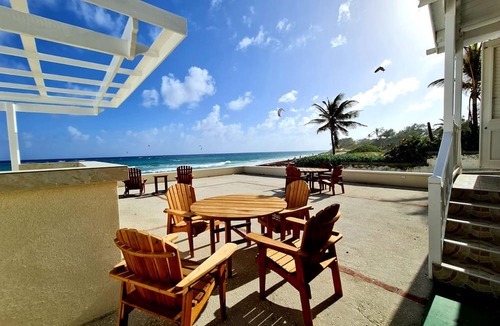 Silver Sands Apartment | Silver Sands Beachfront Condo, Shared Patio - Bar & BBQ, Indoor & Outdoor Dining