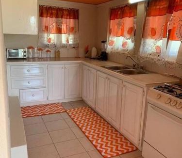 Gibbons Apartment | Lovely 2 bedroom condo with WiFi in a quiet area, 7-10 minutes away from both the airport and Oistins
