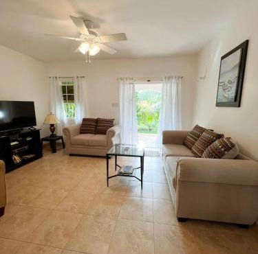 Oistins 2BR Condo with Pool & Patio, Walk to Miami Beach